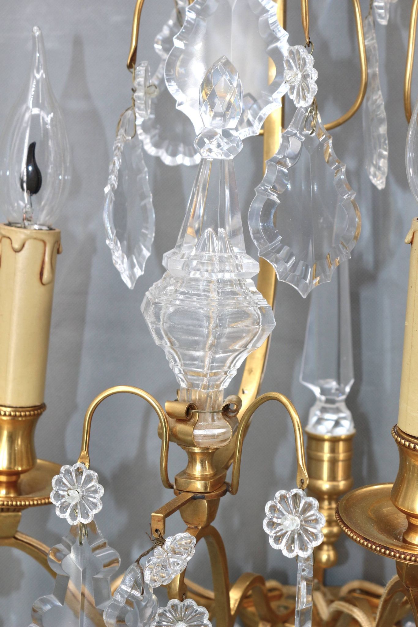 Pair of Louis XVI style gilded bronze & bohemian crystal sconces