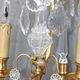 Pair of Louis XVI style gilded bronze & bohemian crystal sconces