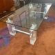Coffee table made of glass and plexiglass.