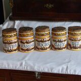 5 ceramic spice jars.