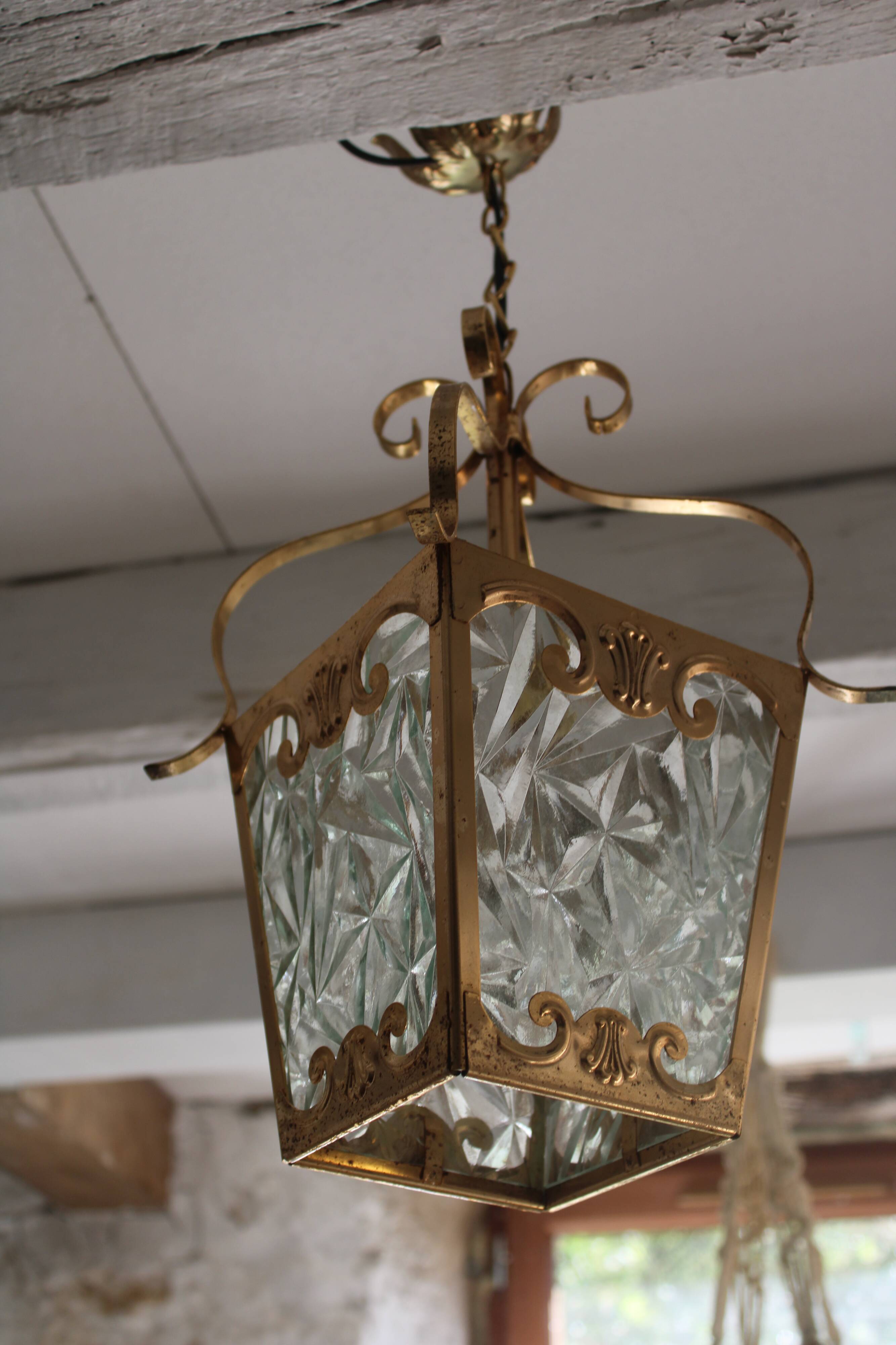 Glass and brass suspension