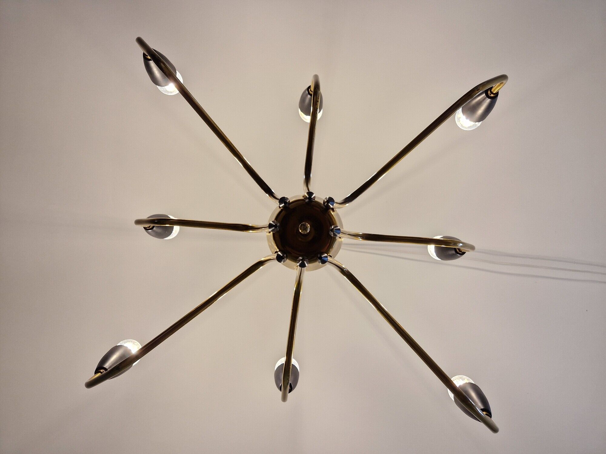 Spider chandelier in brass and black lacquered metal Italian design 1950s