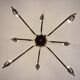 Spider chandelier in brass and black lacquered metal Italian design 1950s