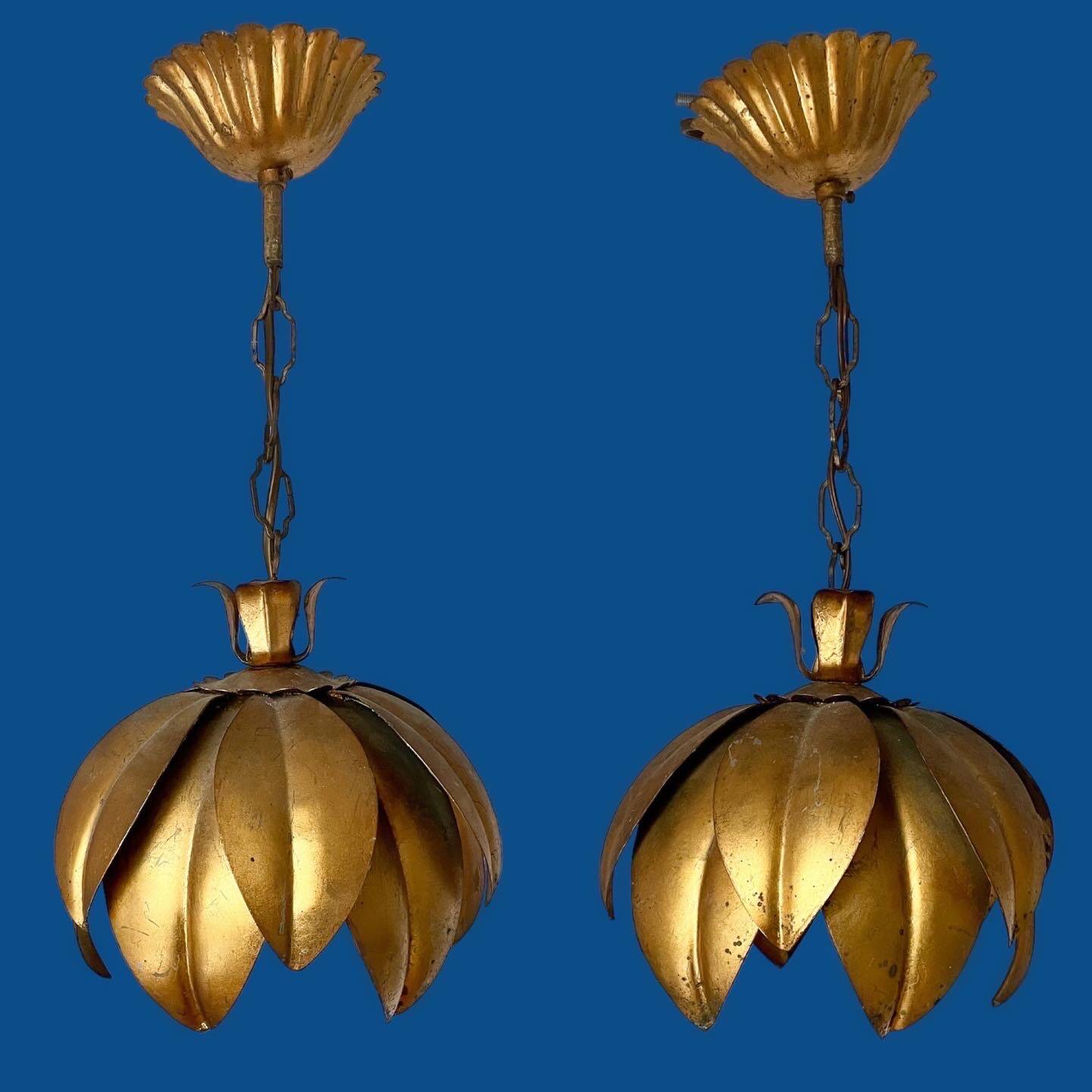 Two vintage pendant lights in gold metal