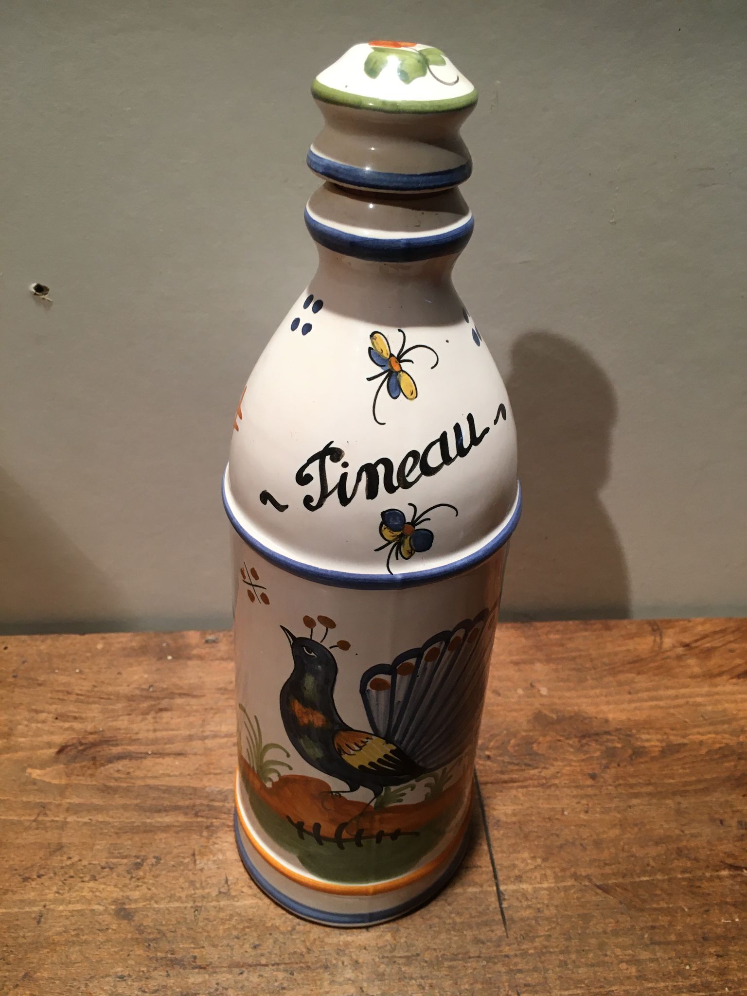 Bouteille à liqueur "Pineau" en faïence