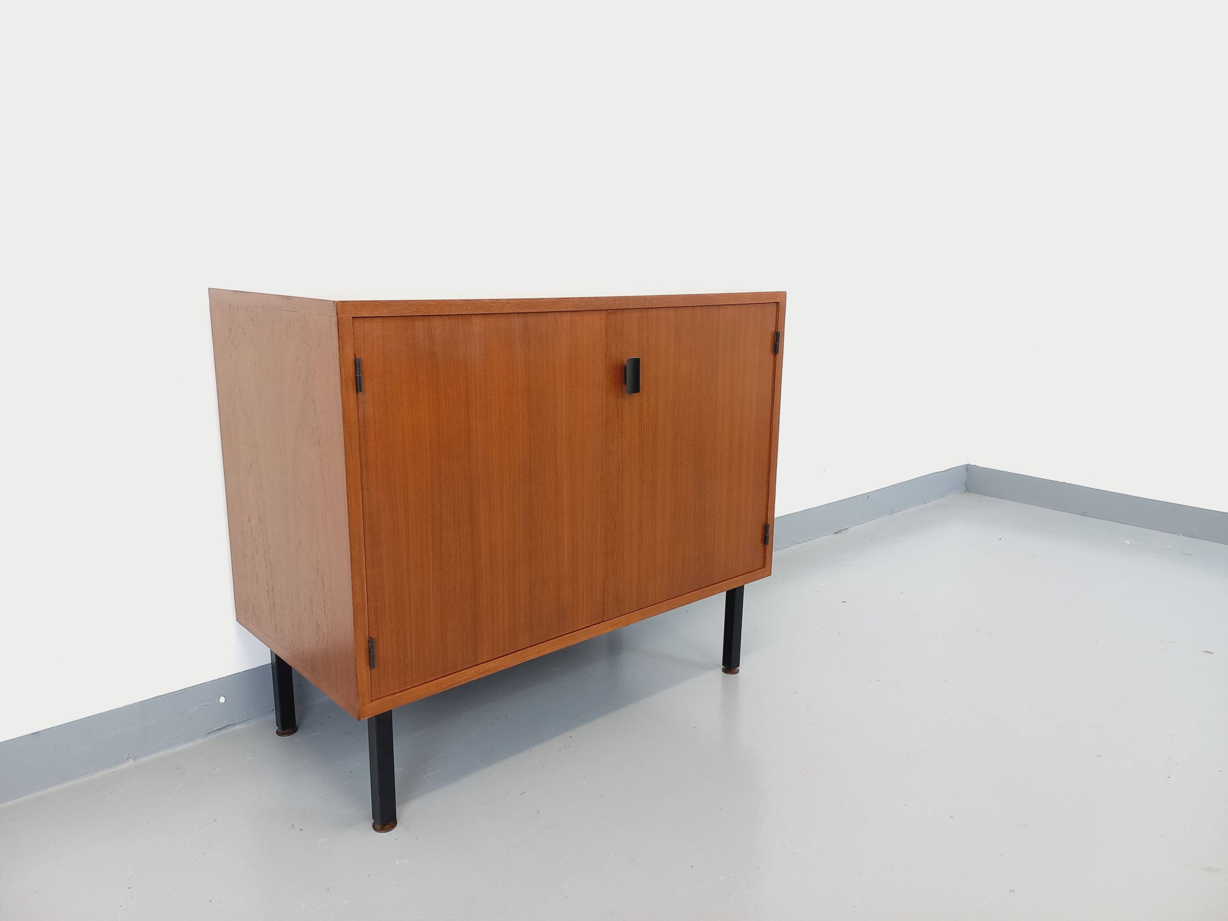 Small vintage storage unit in modernist Scandinavian style in teak from the 60s