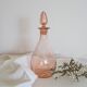 Bouteille en verre rose
