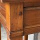 Occasional table in cherry wood, 1 drawer, 1 cane shelf, 1950.