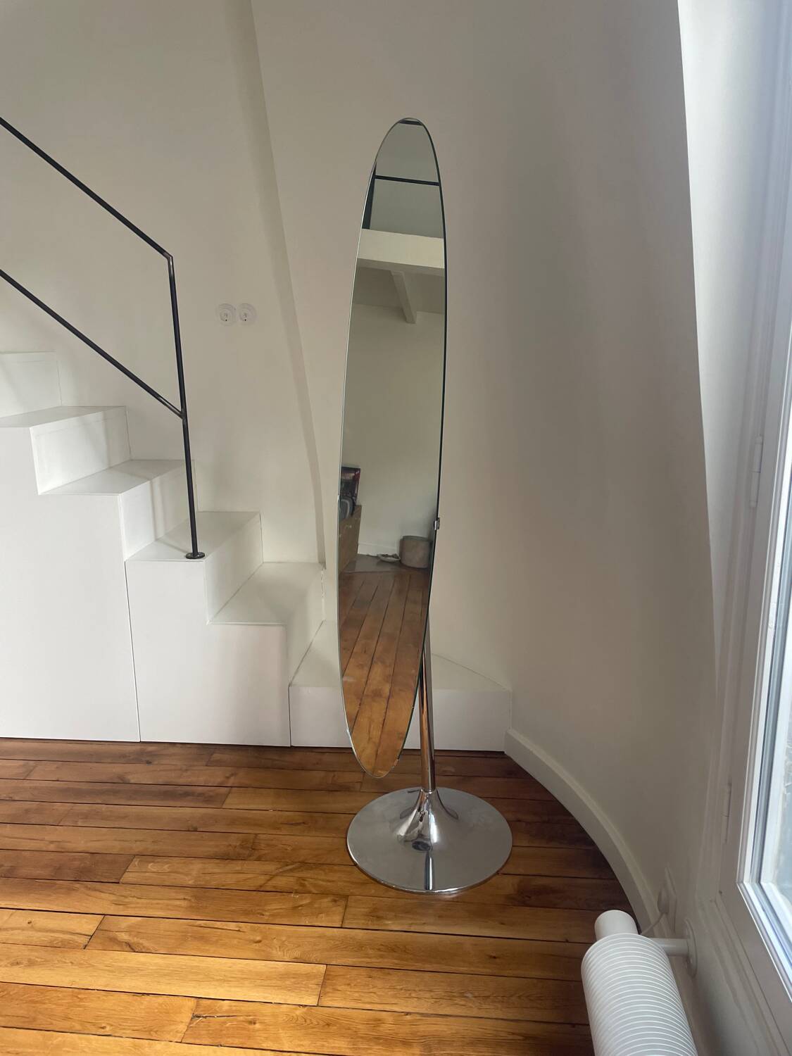 Space age standing mirror