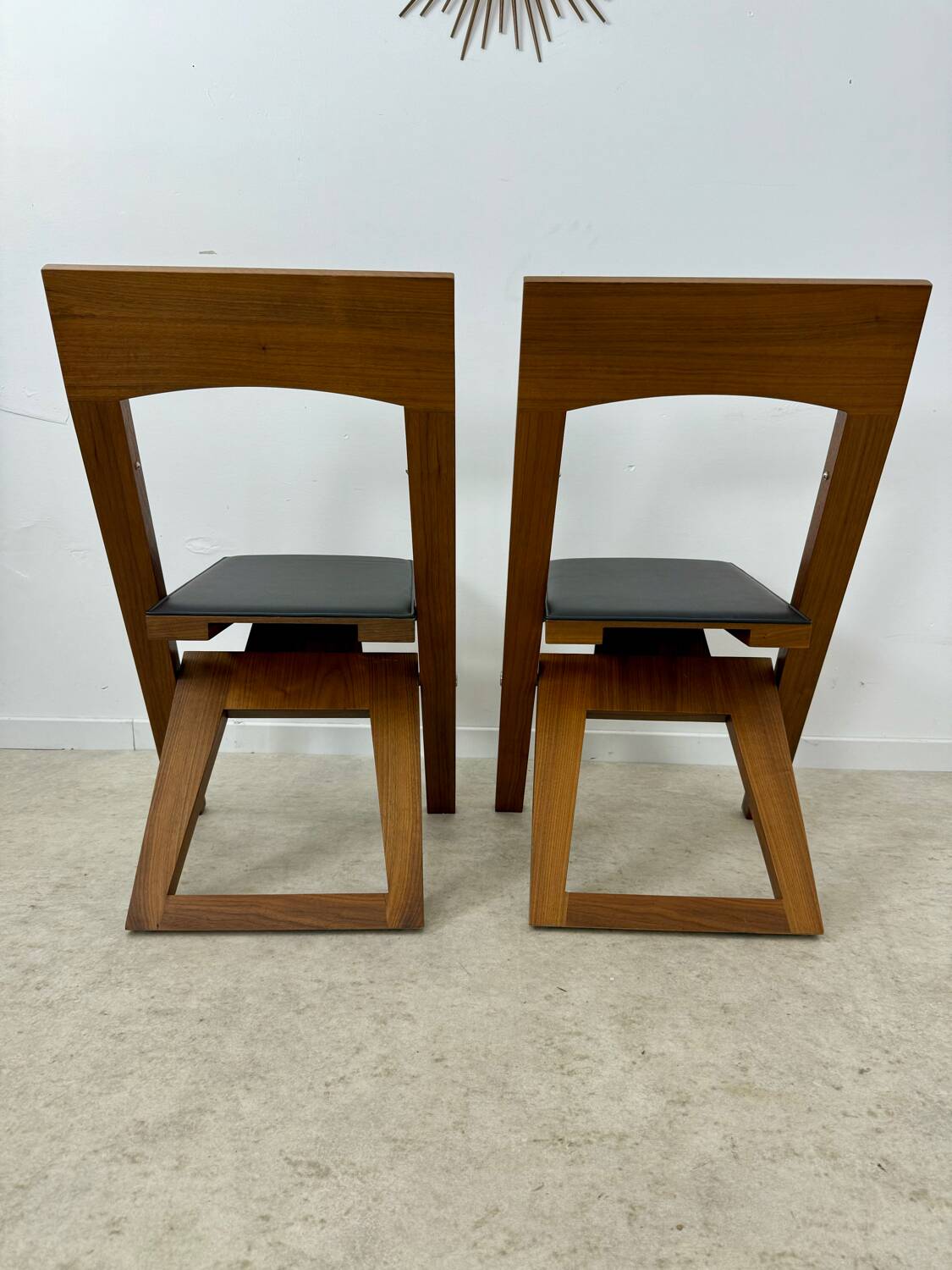 2 old folding chairs in wood and leather, postmodern design from the 80s vintage