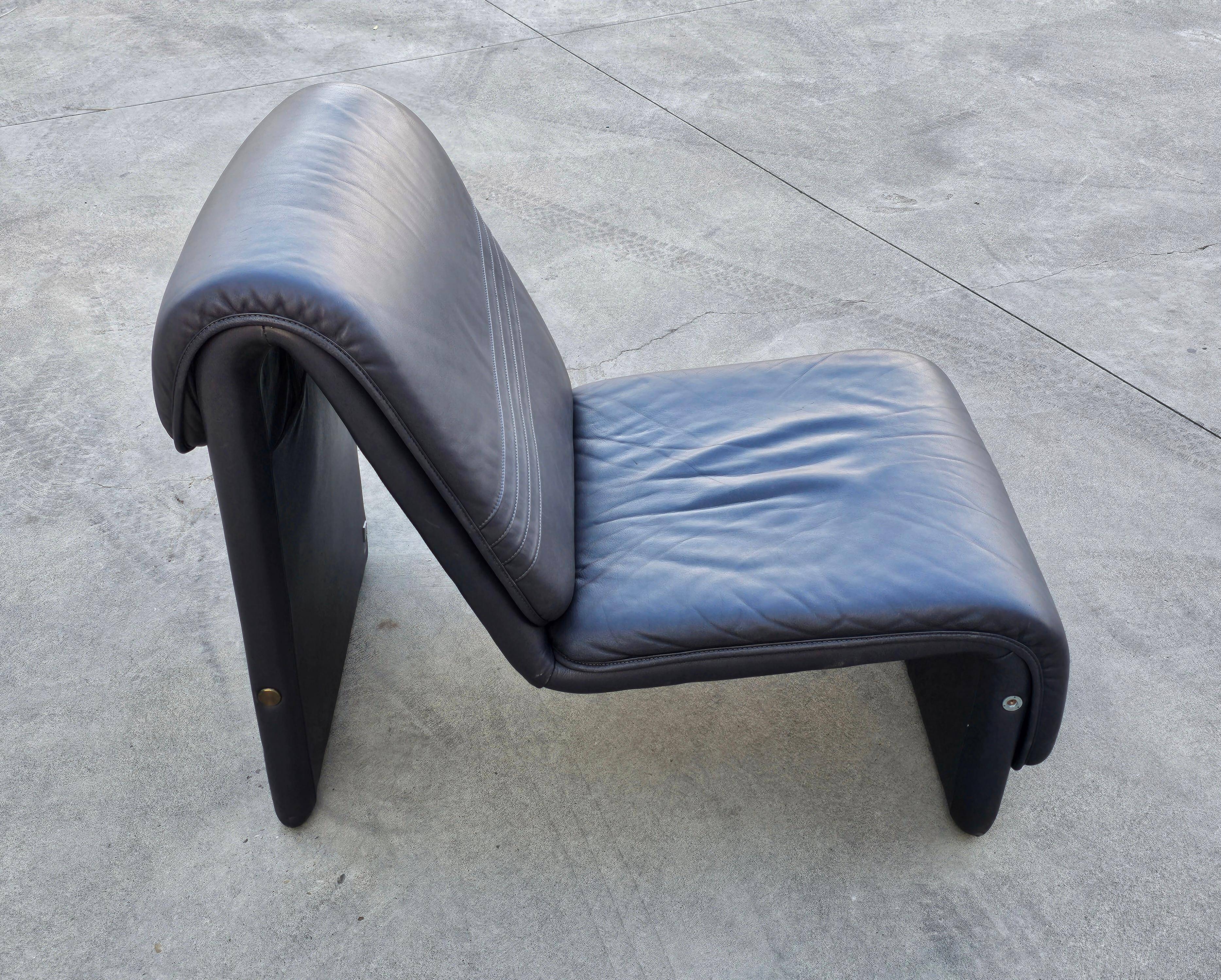 Postmodern leather lounge chairs in the style of Etienne Fermigier 1978.