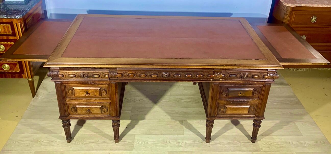 Renaissance style desk in solid oak, richly carved