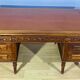 Renaissance style desk in solid oak, richly carved