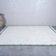 Handmade natural wool rug in green and white, 150x250 cm.