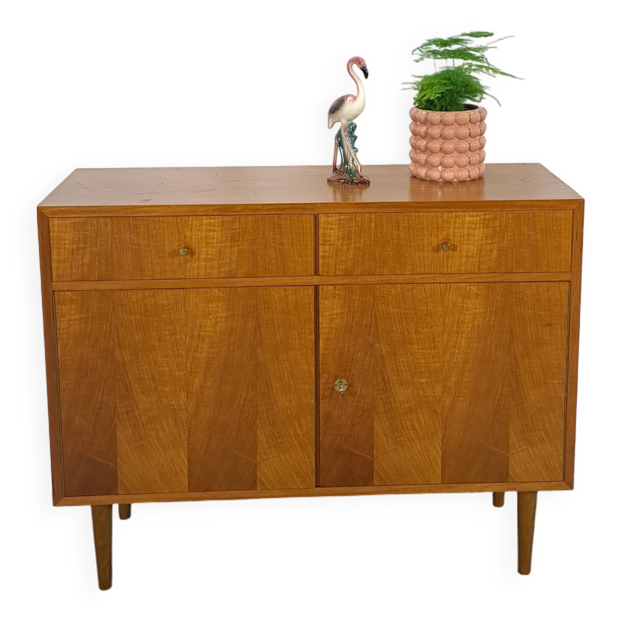 Meuble en placage avec tiroirs et pieds ronds en bois
