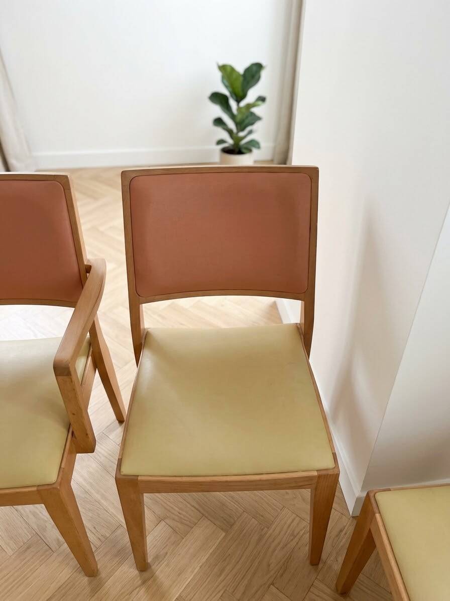 Set of 6 vintage Scandinavian chairs in wood and faux leather.