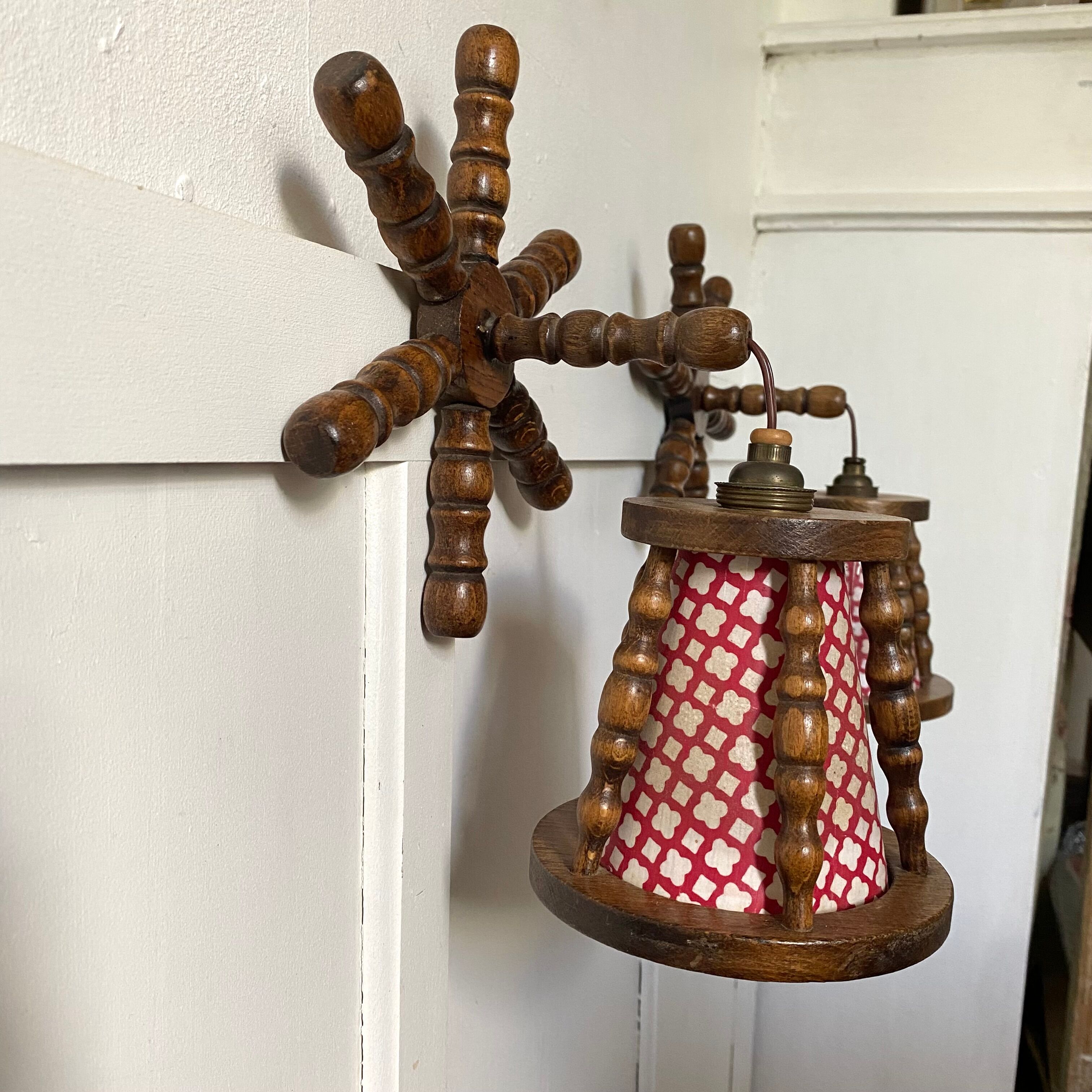 Pair of turned wood wall lights, 1960s