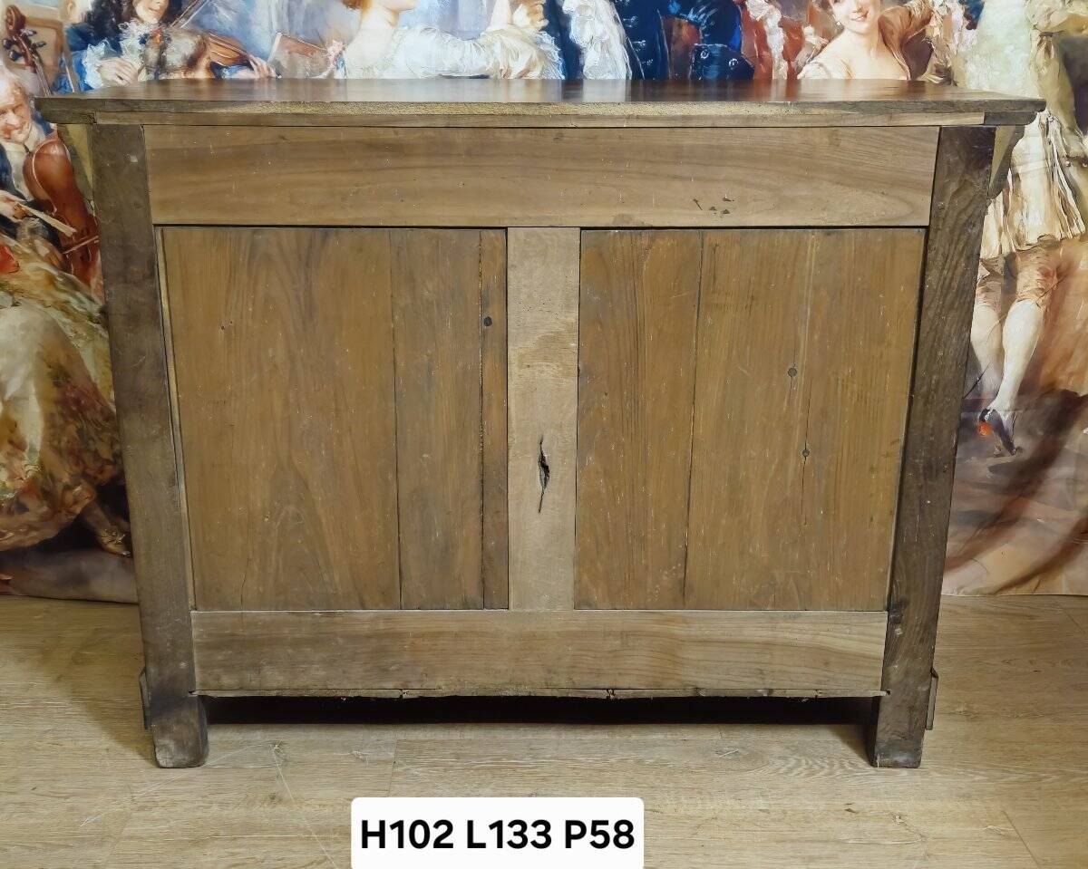 Low buffet with a curved front from the Louis Philippe period in walnut.