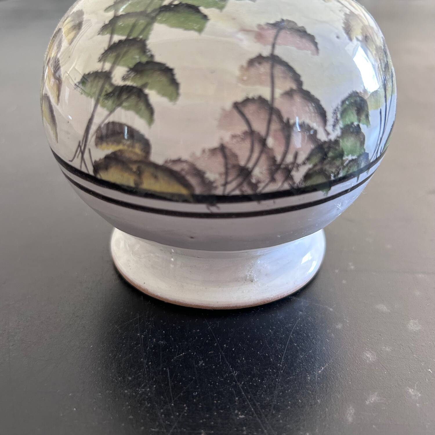 White vase with plant decoration