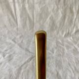 Vintage coat rack in lacquered metal with three golden aluminum hooks