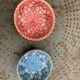 Two bowls, enameled ceramic cups, red and blue, artisanal, hand painted made in Italy