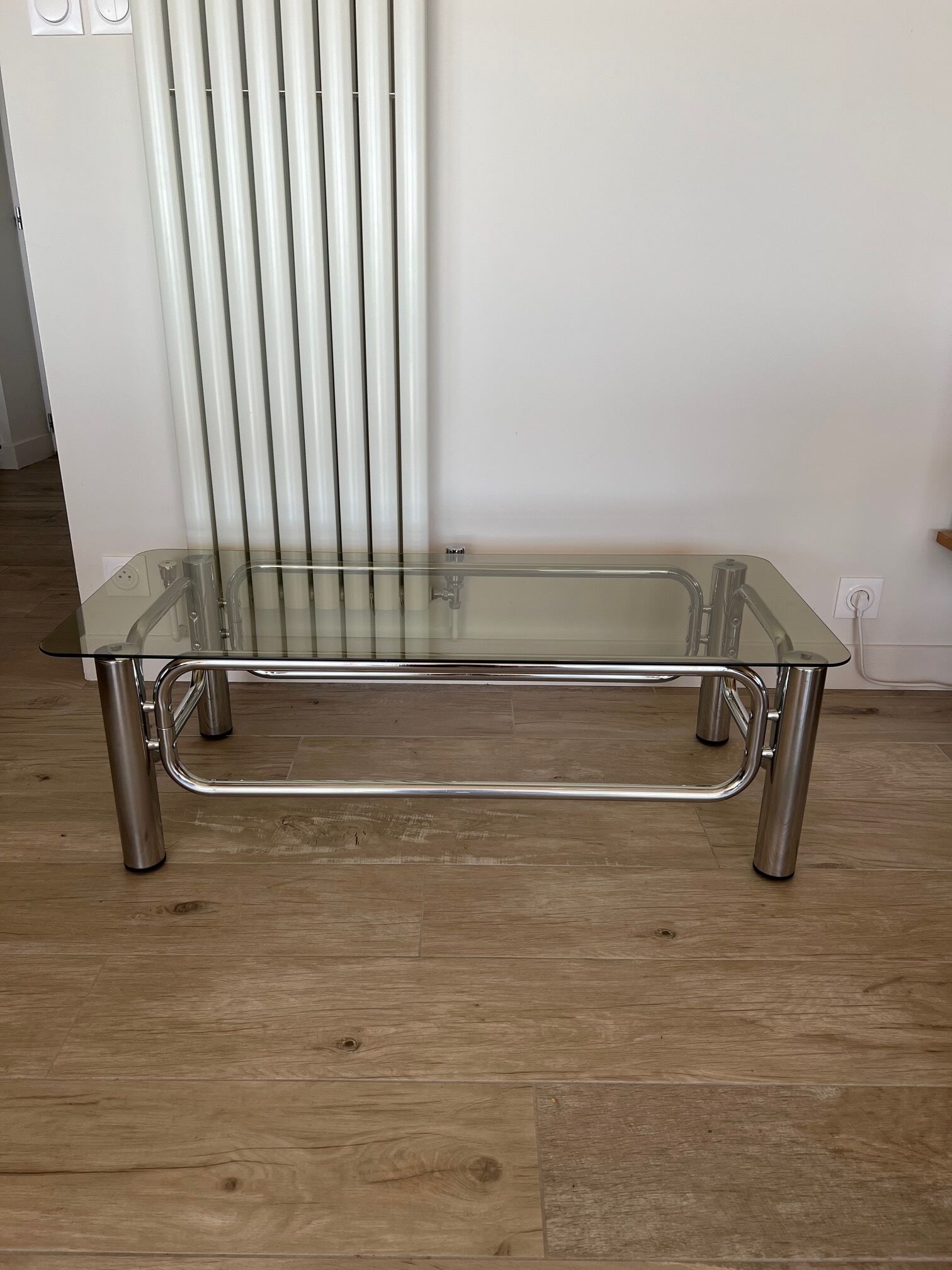 Coffee table in chrome and smoked glass