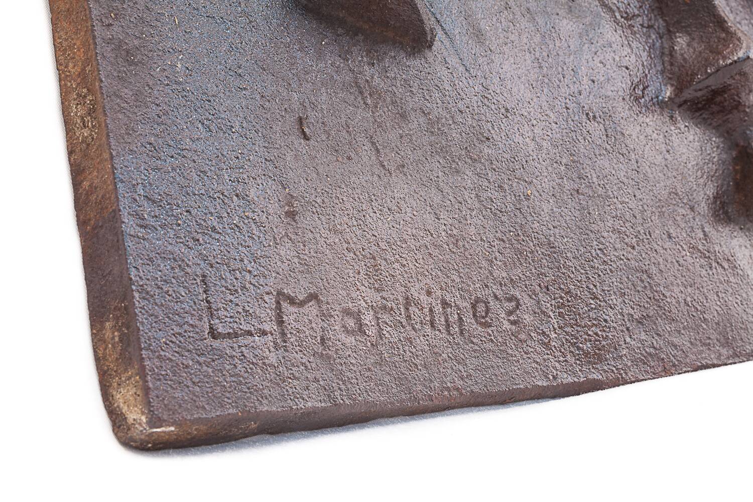 Cast iron fireplace plaque. Signed "L. Martinez". Stern Foundry Circa 19
