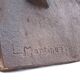 Cast iron fireplace plaque. Signed "L. Martinez". Stern Foundry Circa 19