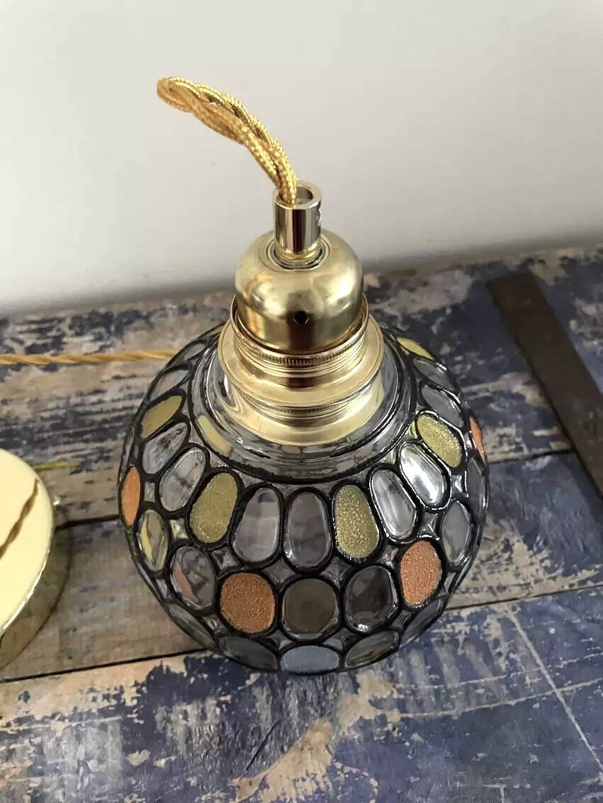 Multicolored faceted globe pendant light