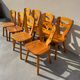 Set of 8 pine chairs in the Les Arcs design style by Charlotte Perriand from the 1970s.