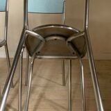 Blue formica table and its 4 chairs