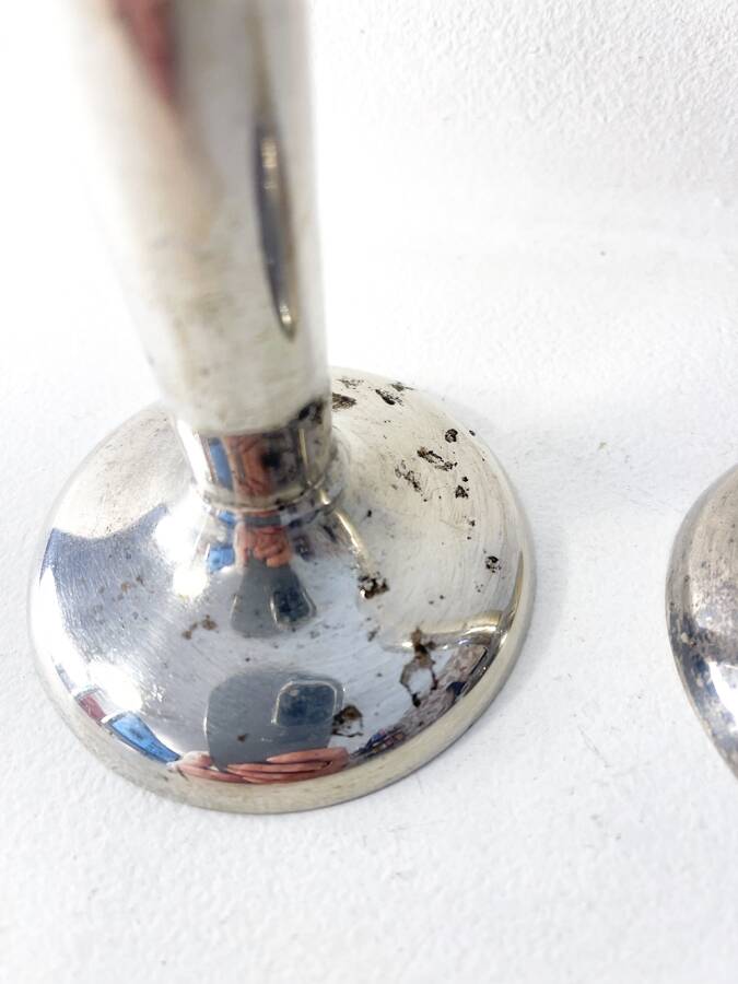 Pair of silver-plated metal candlesticks, 1930