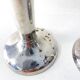 Pair of silver-plated metal candlesticks, 1930