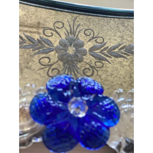 Early 21st century venetian oval floreal hand-carving mirror in murano glass