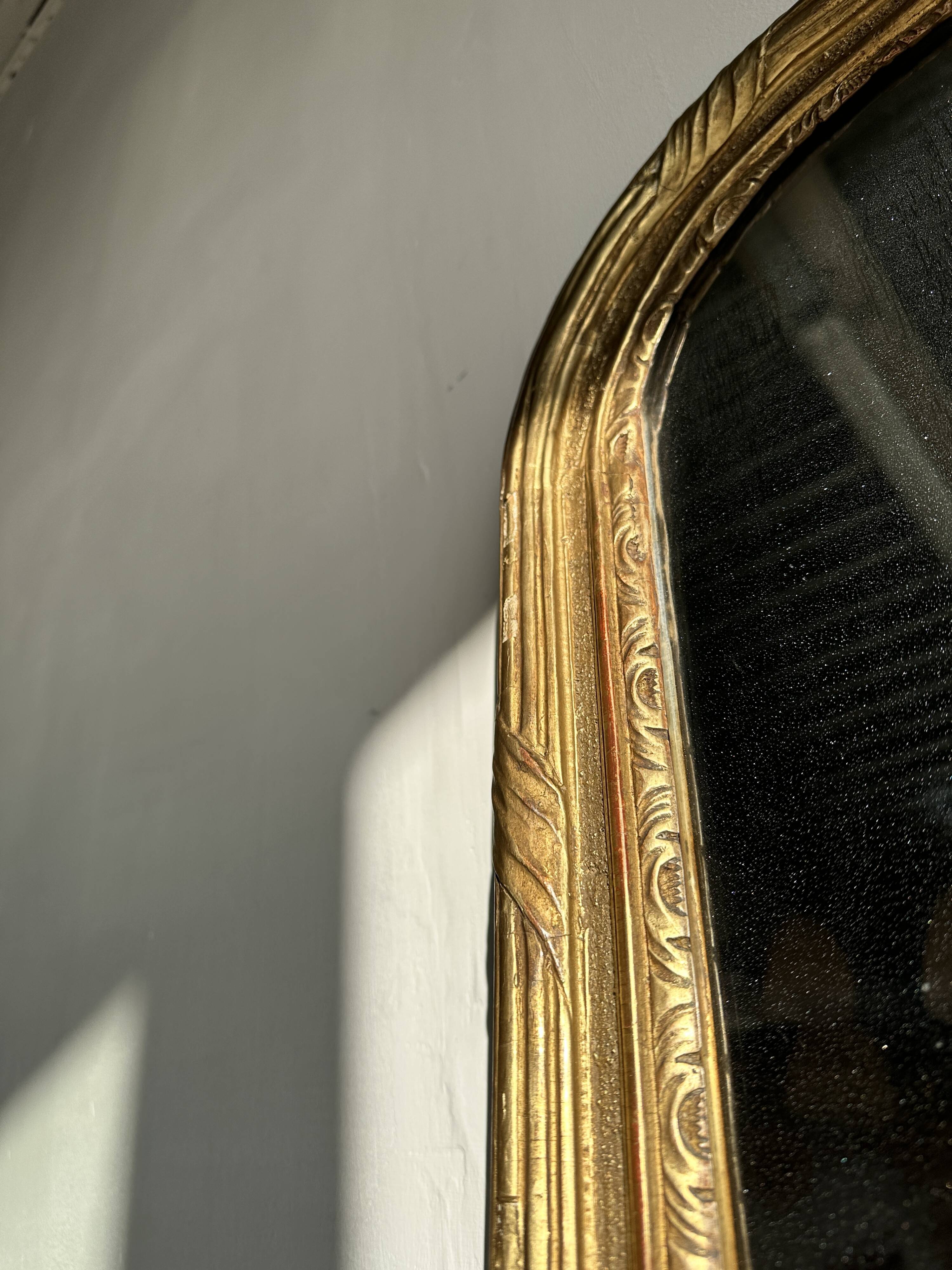 Large gilded mirror 19th century rounded corners mercury glass Louis XVI style