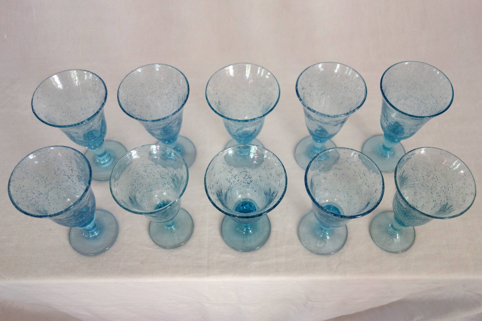 10 footed glasses from the biot glassworks in blown glass.