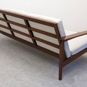 Three-seater modernist teak sofa, France circa 1950.