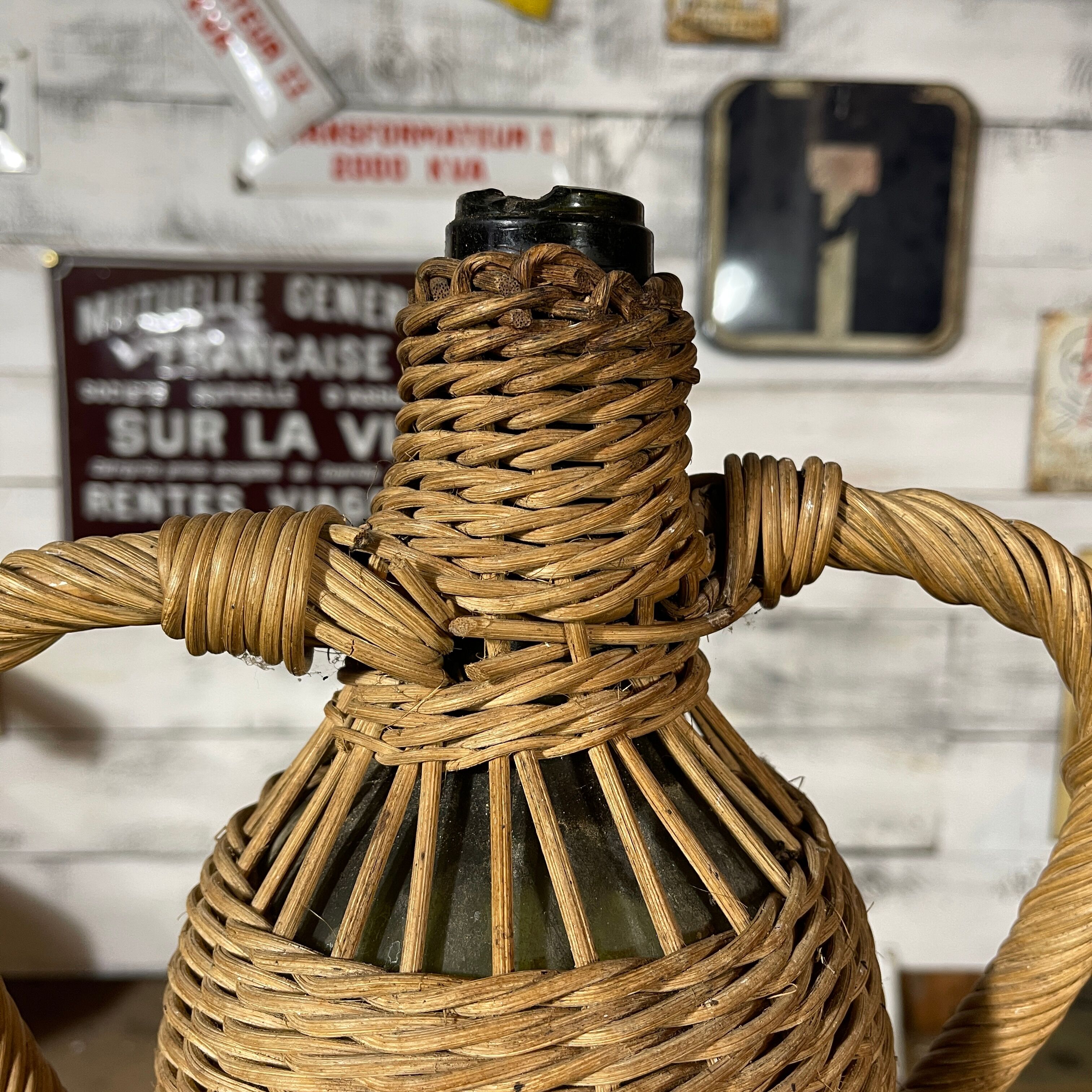 Braided wicker green bottle