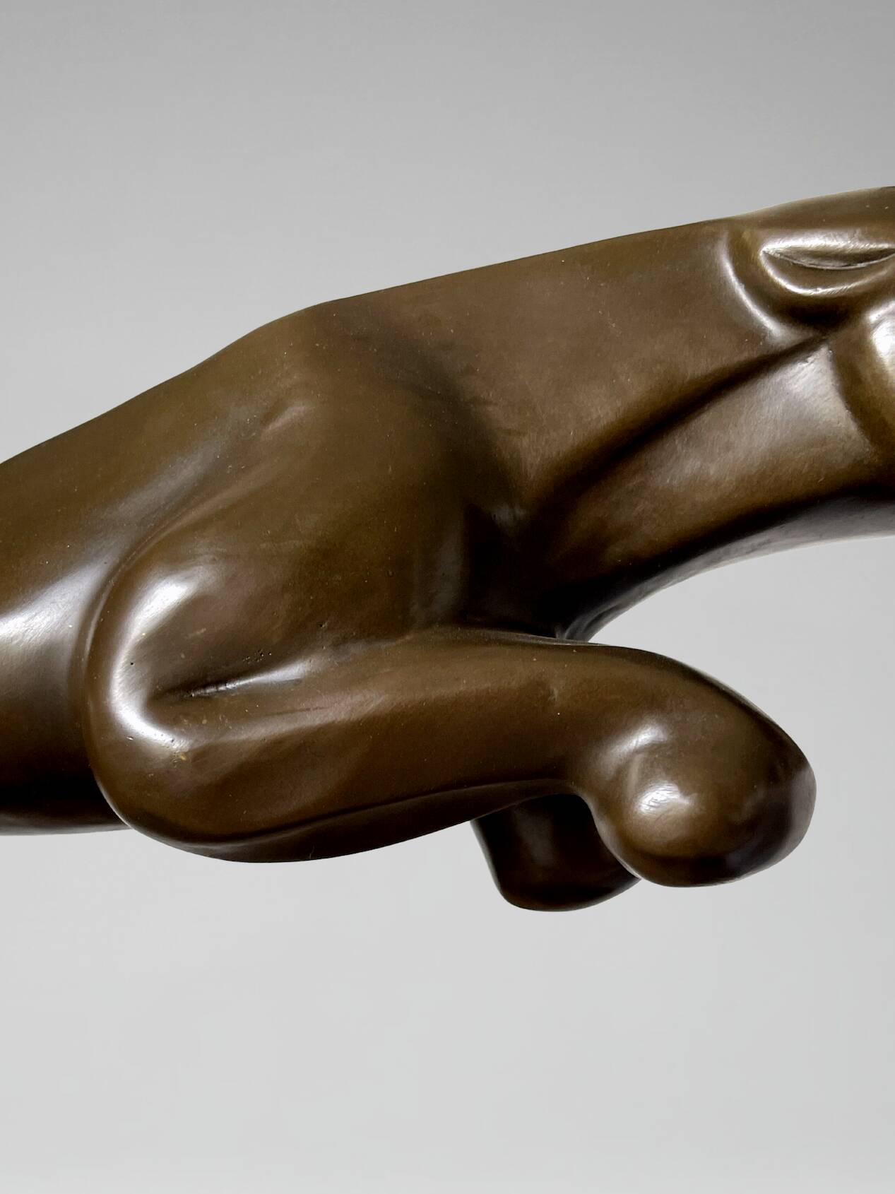 Large Art Deco bronze patinated Jaguar sculpture on an architectural base.
