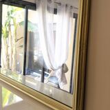 Large golden panoramic mirror