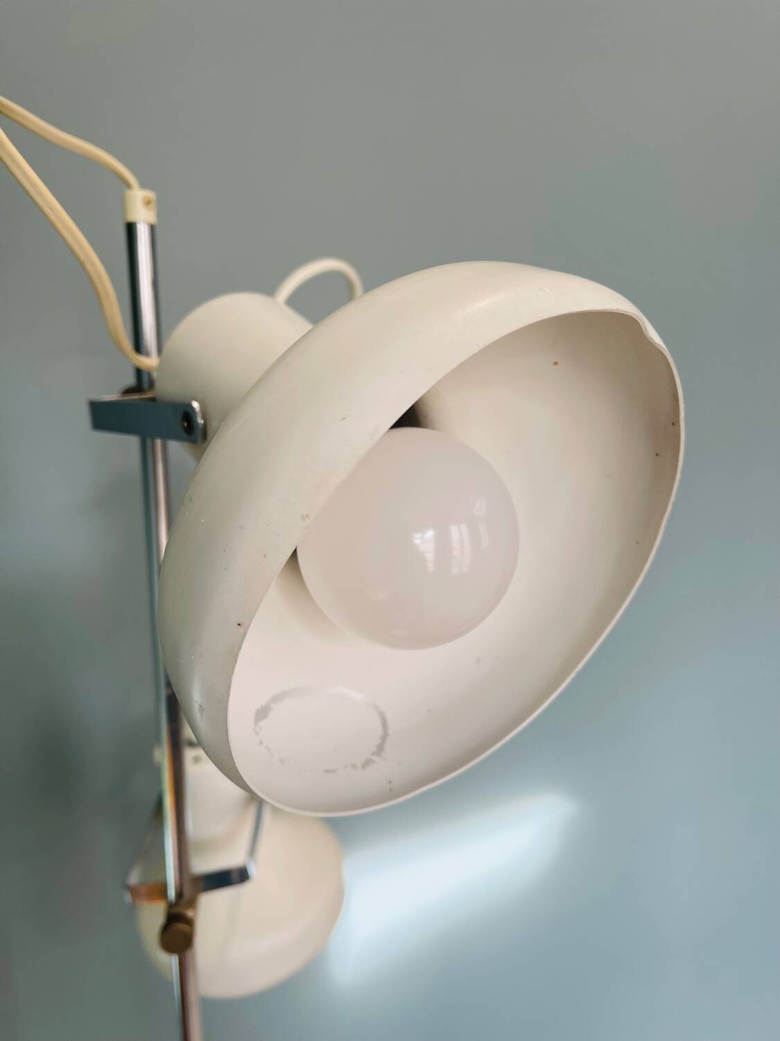 Chrome and white metal floor lamp, circa 1970.