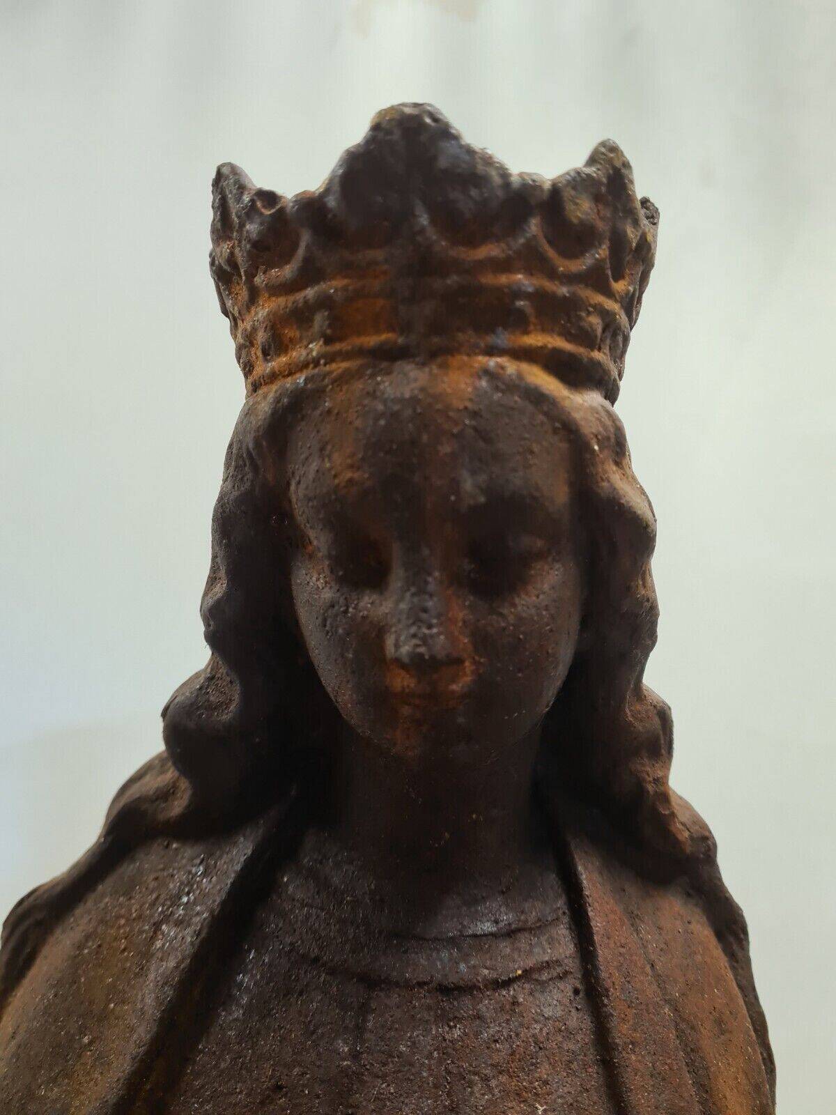 statue of the holy virgin in cast iron