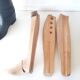 Old wooden shoe trees and their vintage leather rider boots. 1950