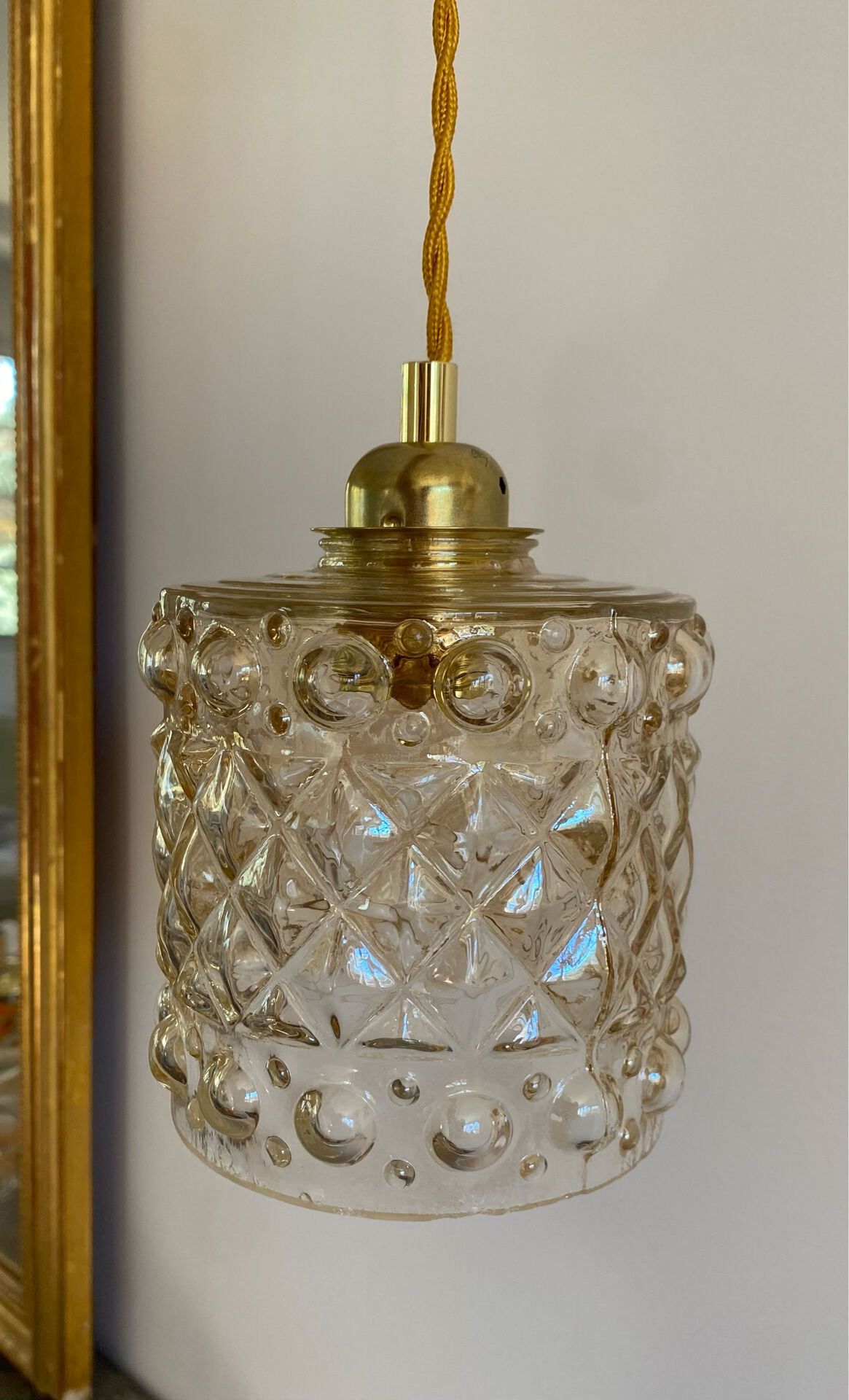 Vintage amber glass suspension globe