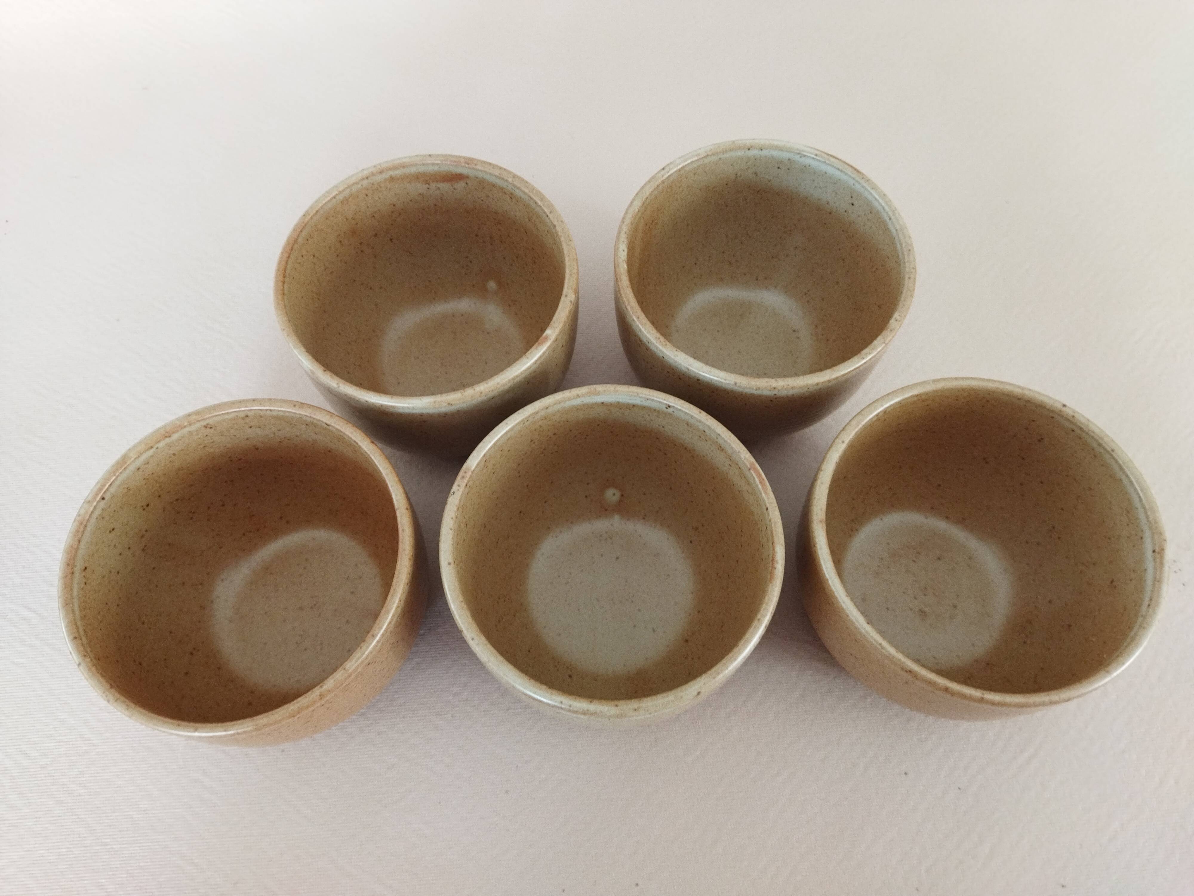 Covered tea bowls in CNP Village sandstone