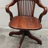 Old American office chair rounded around 1940 in oak