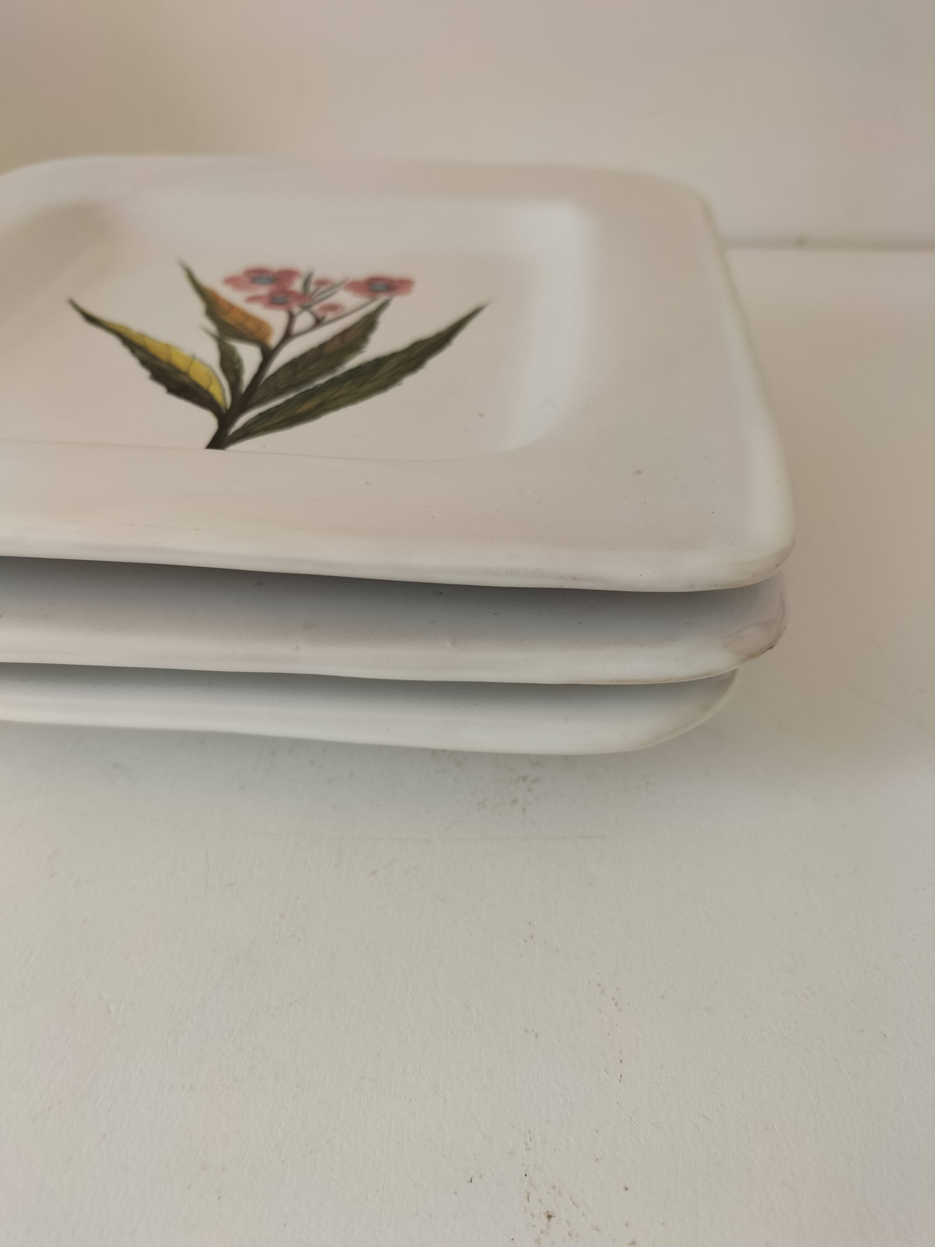 Trio of square Deruta plates signed MARI E.C., botanical decoration 962.21