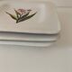 Set of three square plates from Deruta signed MARI E.C., botanical decoration 962.21