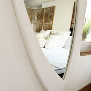 Dismantled Space Age XXL wall mirror in lacquered wood. France, 1970s.