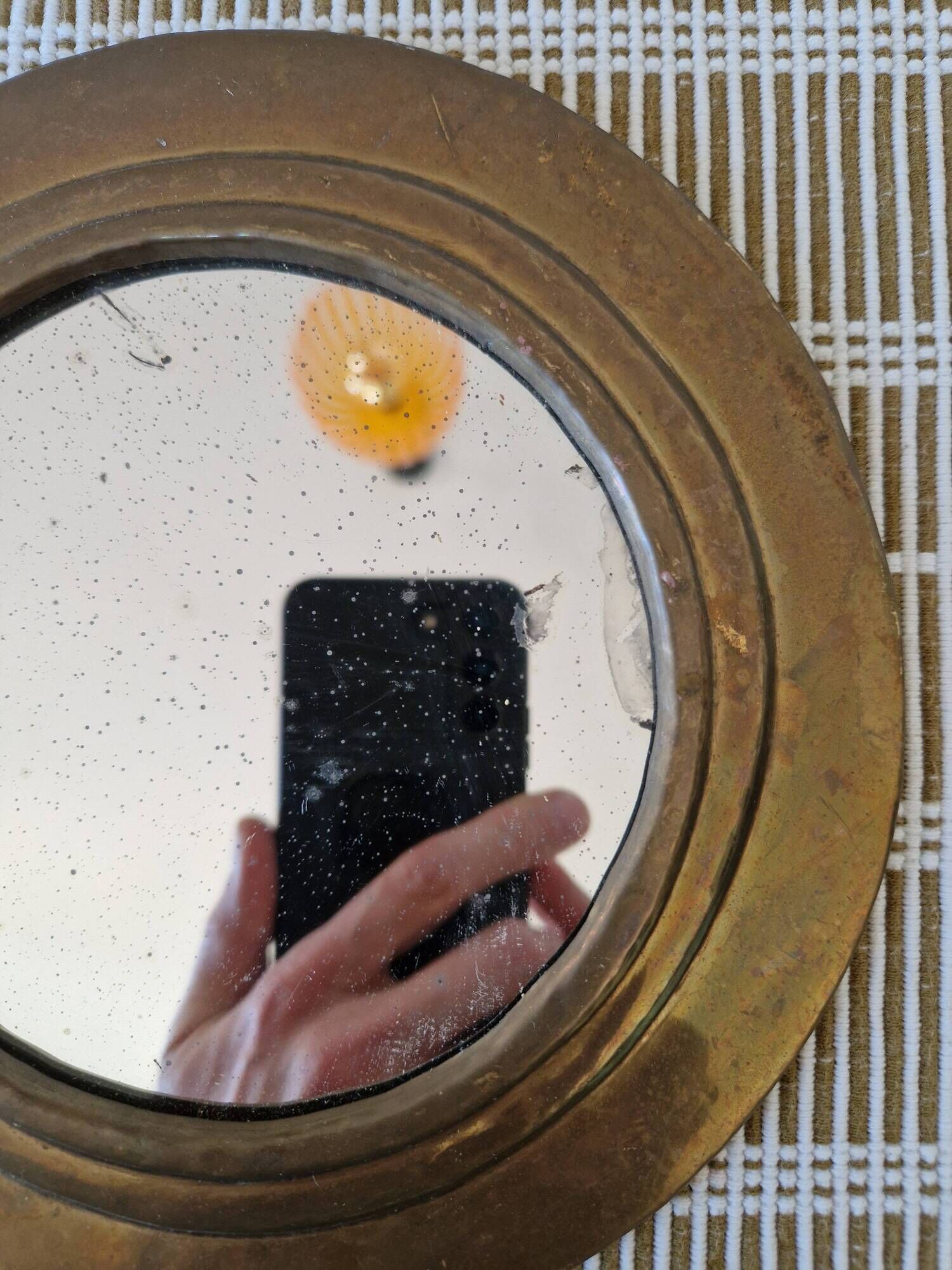 Round brass mirror